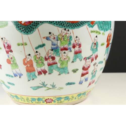 22 - Chinese Porcelain Famille Rose Jardiniere decorated with a procession of figures and musicians withi... 