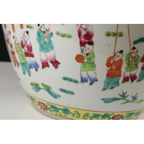 22 - Chinese Porcelain Famille Rose Jardiniere decorated with a procession of figures and musicians withi... 