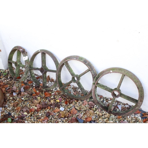 549 - Set of Four Cast Iron Wheels, each with four spokes, 48cm diameter