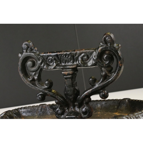 64 - Victorian Cast Iron Boot Scraper, decorative design on oval base, 36cm long x 18cm high