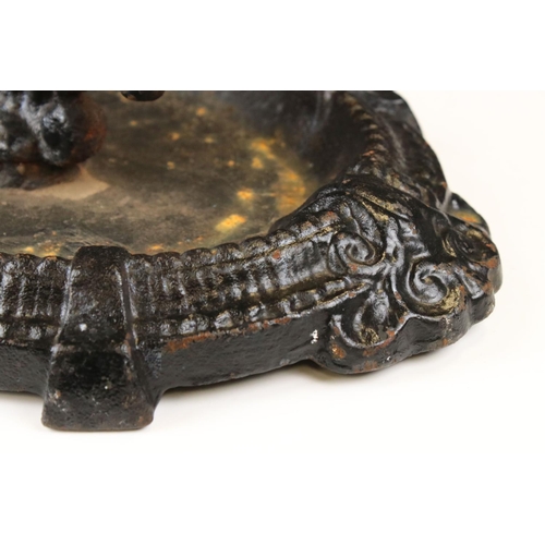 64 - Victorian Cast Iron Boot Scraper, decorative design on oval base, 36cm long x 18cm high