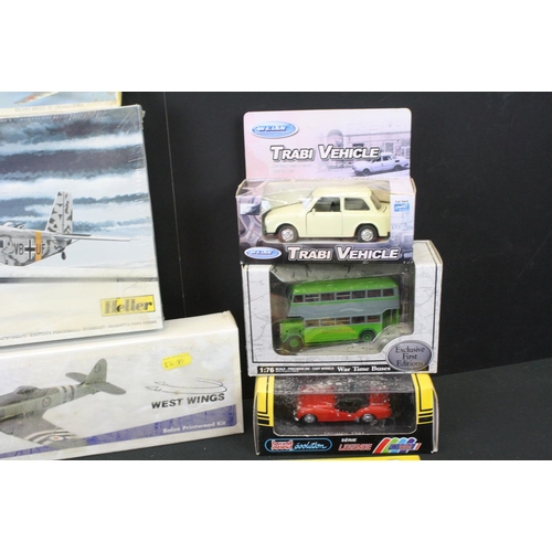 354 - Group of 14 boxed plastic & wooden kits and diecast models, to include sealed West Wings Hawker Sea ... 