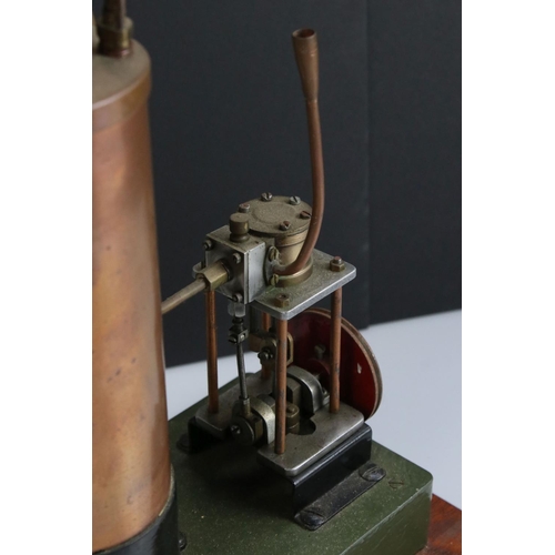 313 - Metal & brass stationary steam engine, unmarked and possibly scratch built, wooden base 17 x 8