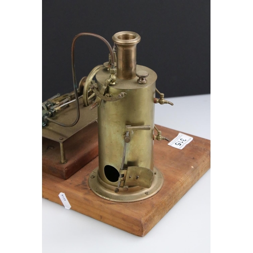 315 - Brass stationary steam engine on wooden base, 10 x 9