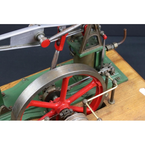 317 - Stuart Turner Beam Stationary Engine in main body green, on wooden base, 14.5 x 9