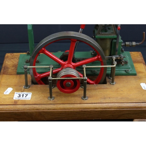 317 - Stuart Turner Beam Stationary Engine in main body green, on wooden base, 14.5 x 9