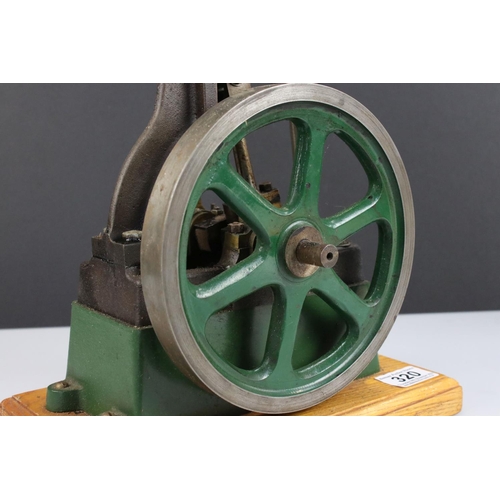 320 - Stuart Turner Stationary Steam Engine in main body green, on wooden base, base 10 x 6.5