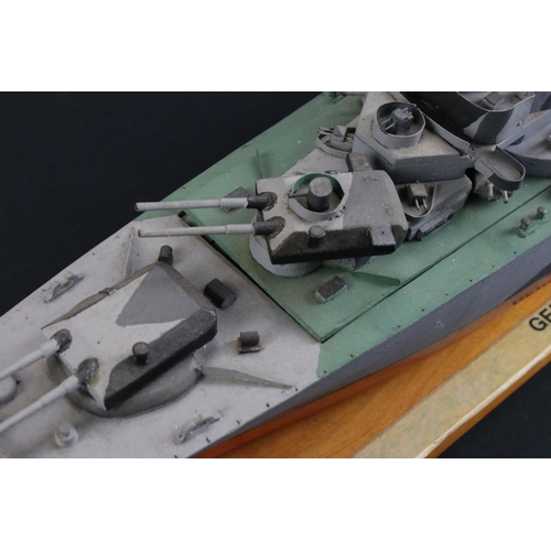 329 - Two painted wooden models of batlteships to include Bismarck and Tirpitz