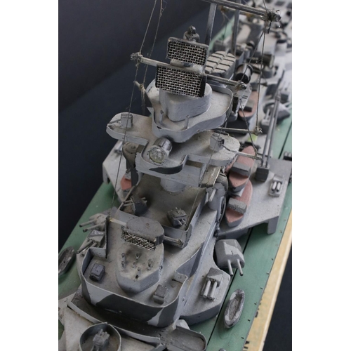 329 - Two painted wooden models of batlteships to include Bismarck and Tirpitz