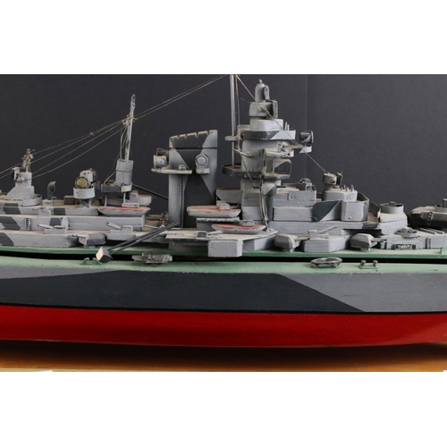 329 - Two painted wooden models of batlteships to include Bismarck and Tirpitz