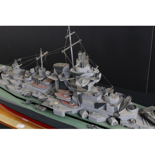 329 - Two painted wooden models of batlteships to include Bismarck and Tirpitz