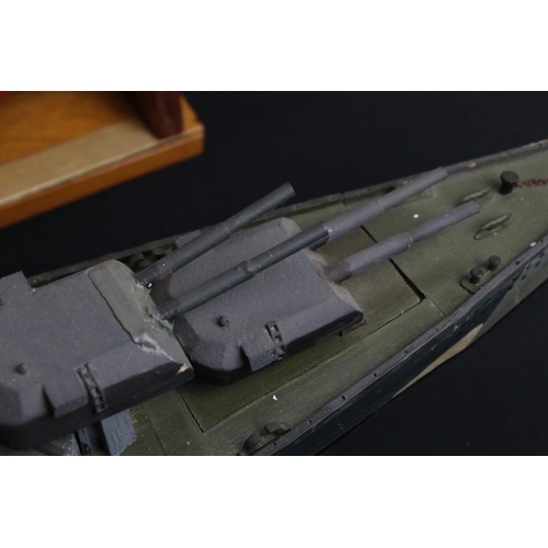 329 - Two painted wooden models of batlteships to include Bismarck and Tirpitz