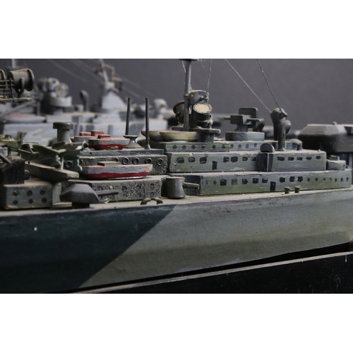 329 - Two painted wooden models of batlteships to include Bismarck and Tirpitz