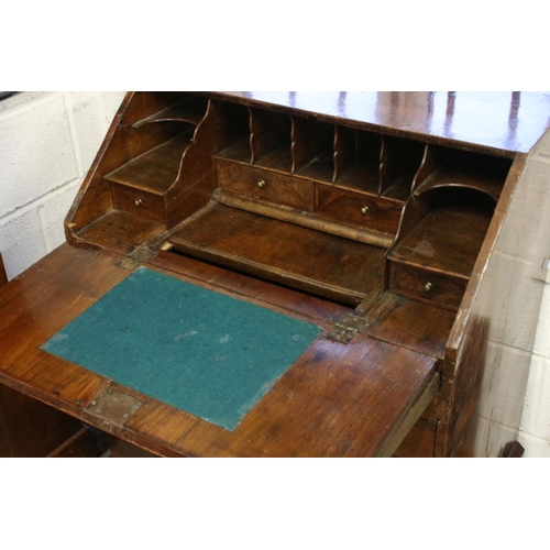 118 - Early 18th century Walnut and Feather Banded Bureau, the fall front opening to a fitted interior wit... 