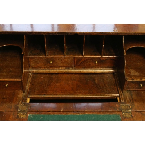 118 - Early 18th century Walnut and Feather Banded Bureau, the fall front opening to a fitted interior wit... 