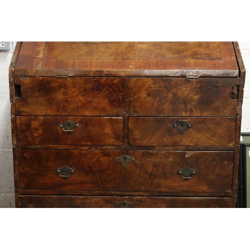 118 - Early 18th century Walnut and Feather Banded Bureau, the fall front opening to a fitted interior wit... 