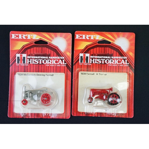 1237A - 16 Carded Ertl Historical International Harvester Toy Tractors