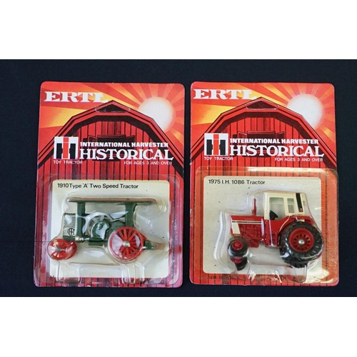 1237A - 16 Carded Ertl Historical International Harvester Toy Tractors