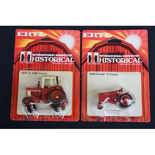 1237A - 16 Carded Ertl Historical International Harvester Toy Tractors