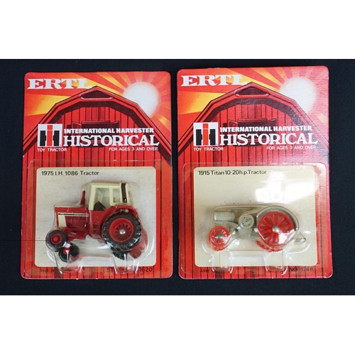 1237A - 16 Carded Ertl Historical International Harvester Toy Tractors