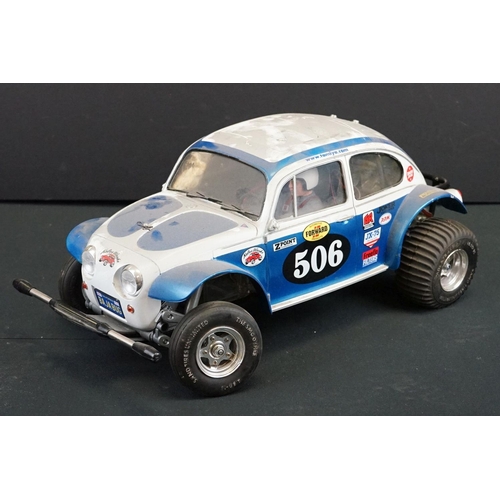 403A - Two Radio Control Cars to include 1 x Tamiya Baja Bug in blue and white, Tamiya Toyota Hilux in blac... 