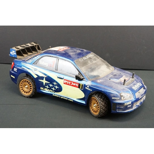 403A - Two Radio Control Cars to include 1 x Tamiya Baja Bug in blue and white, Tamiya Toyota Hilux in blac... 