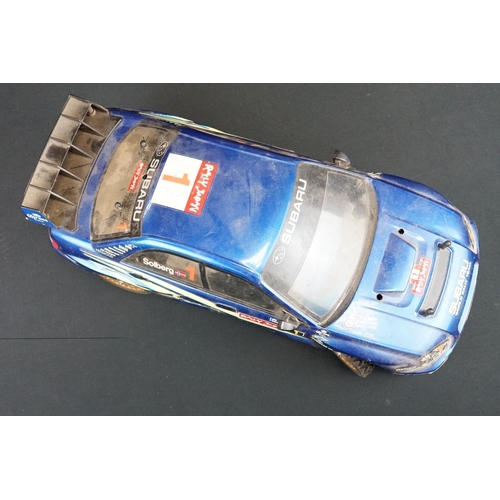 403A - Two Radio Control Cars to include 1 x Tamiya Baja Bug in blue and white, Tamiya Toyota Hilux in blac... 