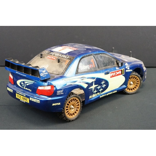 403A - Two Radio Control Cars to include 1 x Tamiya Baja Bug in blue and white, Tamiya Toyota Hilux in blac... 