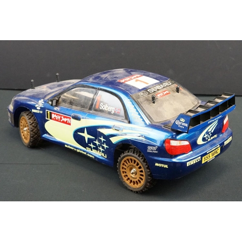 403A - Two Radio Control Cars to include 1 x Tamiya Baja Bug in blue and white, Tamiya Toyota Hilux in blac... 