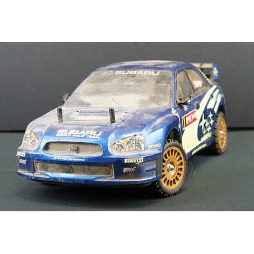 403A - Two Radio Control Cars to include 1 x Tamiya Baja Bug in blue and white, Tamiya Toyota Hilux in blac... 