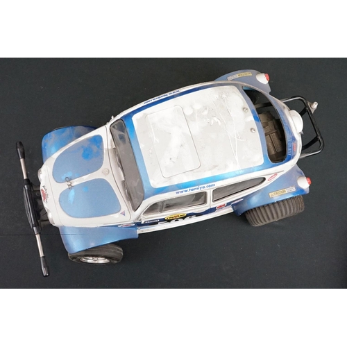 403A - Two Radio Control Cars to include 1 x Tamiya Baja Bug in blue and white, Tamiya Toyota Hilux in blac... 