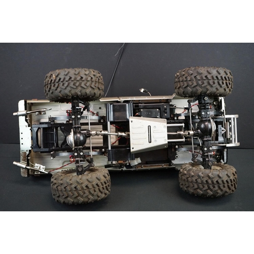 403A - Two Radio Control Cars to include 1 x Tamiya Baja Bug in blue and white, Tamiya Toyota Hilux in blac... 