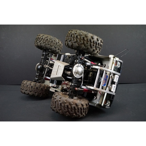 403A - Two Radio Control Cars to include 1 x Tamiya Baja Bug in blue and white, Tamiya Toyota Hilux in blac... 