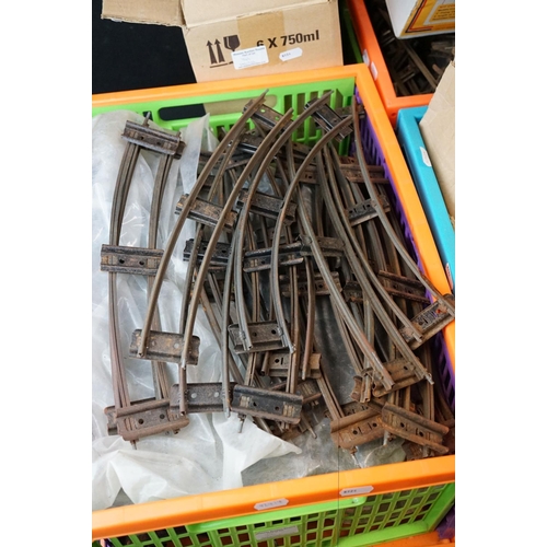 161 - Large quantity of O & OO gauge model railway track plus addition accessories to include trackside bu... 