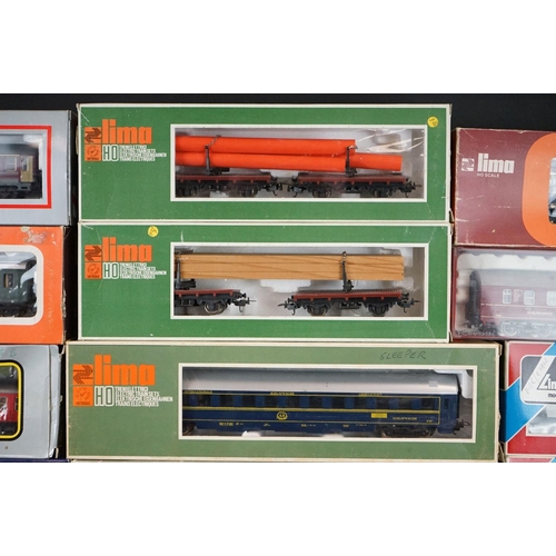 180 - 24 Boxed HO / OO gauge items of rolling stock to include 18 x Lima, 1 x Roco, 2 x Ibertren, 1 x Joue... 