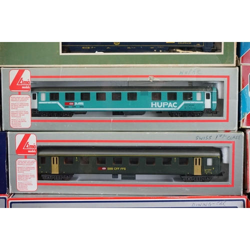 180 - 24 Boxed HO / OO gauge items of rolling stock to include 18 x Lima, 1 x Roco, 2 x Ibertren, 1 x Joue... 