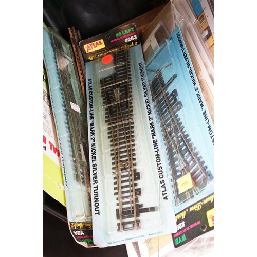 182 - Quantity of OO gauge model railway accessories to include carded Atlas track, unopened SuperQuick Mo... 