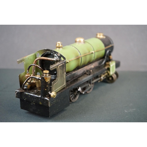 186 - O gauge 4-4-0 steam locomotive painted in green, unmarked, showing some paint wear