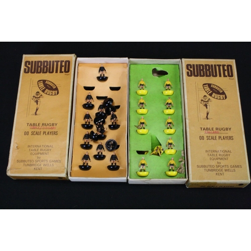 409 - Subbuteo - Eight boxed Rugby teams in a good play worn condition overall, tatty boxes with teams to ... 