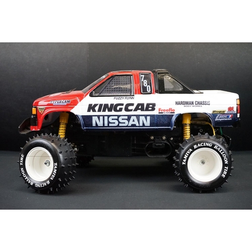 396 - Tamiya 1/10 R/C Nissan King Cab off road racer radio control car, with instructions