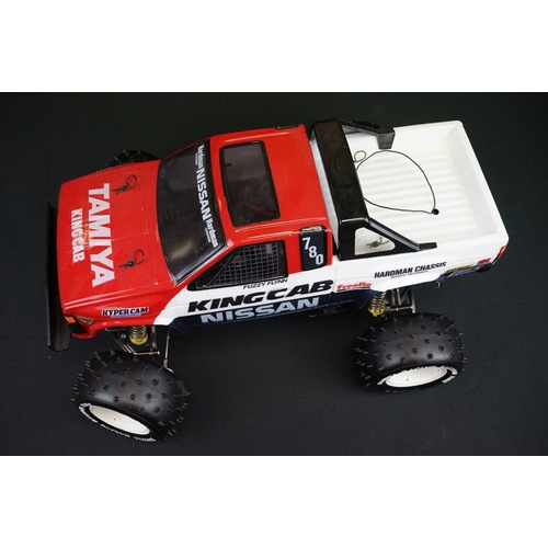 396 - Tamiya 1/10 R/C Nissan King Cab off road racer radio control car, with instructions