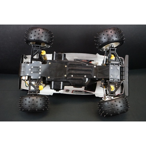 396 - Tamiya 1/10 R/C Nissan King Cab off road racer radio control car, with instructions