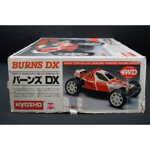 402 - Boxed Kyosho 1:8 Burns DX 4WD Radio Controlled .21 Engine Powered Racing Buggy