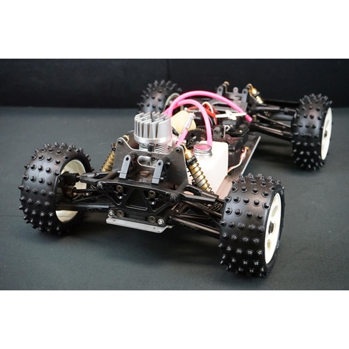 402 - Boxed Kyosho 1:8 Burns DX 4WD Radio Controlled .21 Engine Powered Racing Buggy