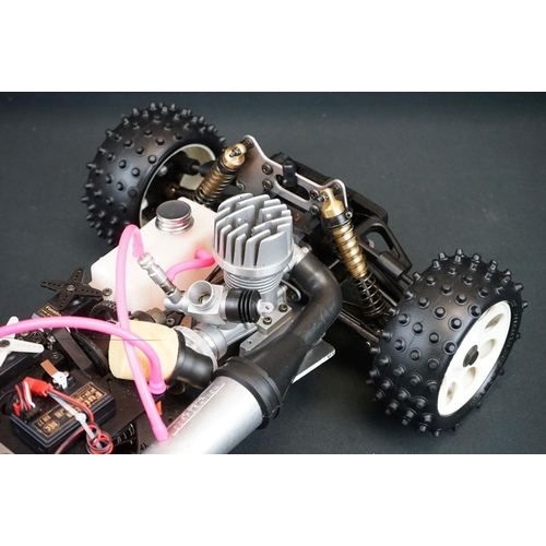 402 - Boxed Kyosho 1:8 Burns DX 4WD Radio Controlled .21 Engine Powered Racing Buggy