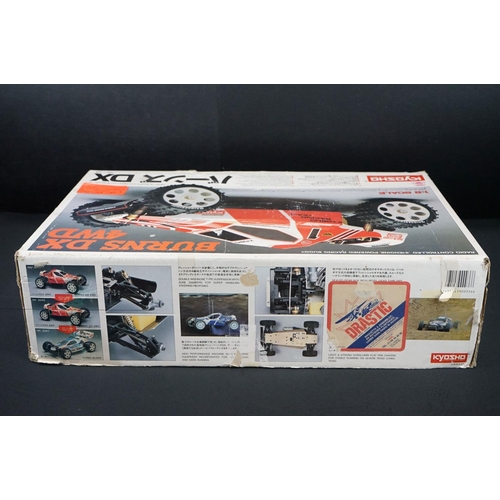 402 - Boxed Kyosho 1:8 Burns DX 4WD Radio Controlled .21 Engine Powered Racing Buggy