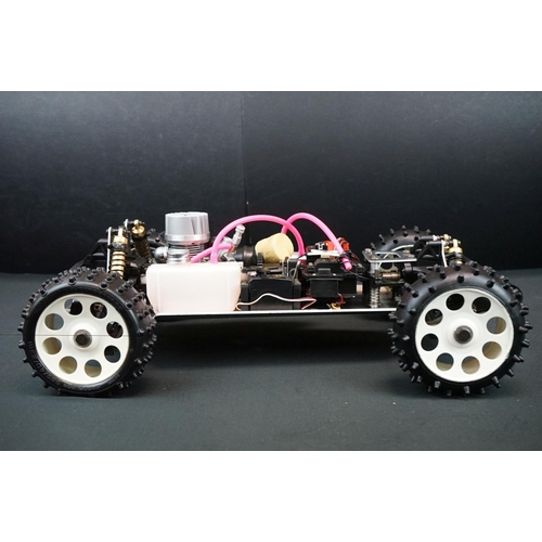 402 - Boxed Kyosho 1:8 Burns DX 4WD Radio Controlled .21 Engine Powered Racing Buggy