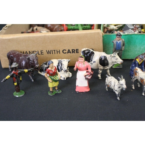 448 - Collection of mid 20th C Britains farming related figures to include various animals, farmers and ac... 