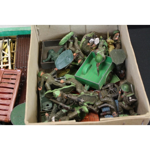 448 - Collection of mid 20th C Britains farming related figures to include various animals, farmers and ac... 