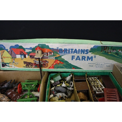 448 - Collection of mid 20th C Britains farming related figures to include various animals, farmers and ac... 